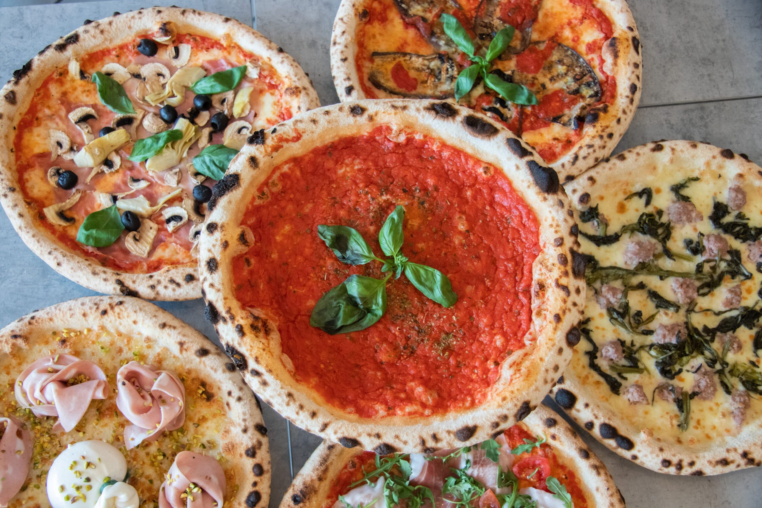 Il Coca-Cola Pizza Village torna a Pozzuoli dal 7 al 12 luglio con 22 pizzerie e concerti.